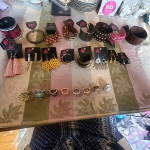 Costume Jewelry Lot Of 27. 8 Bracelets. 8 Earrings. 8 Rings NWT List 7